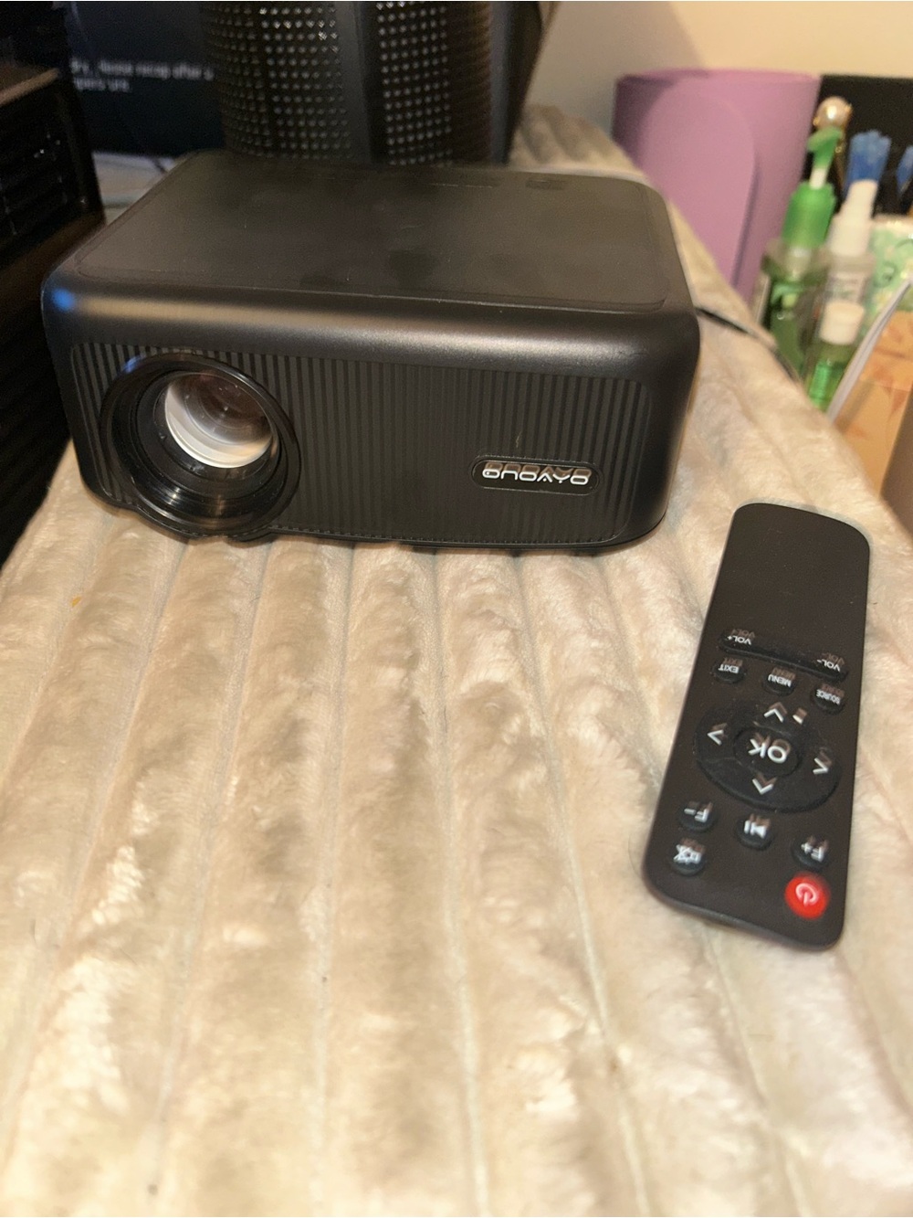 On Running Black Portable Media Projector with Remote